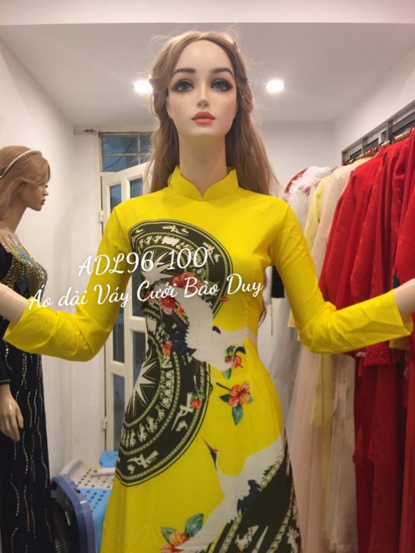 áo dài trống đồng Việt Nam màu vàng